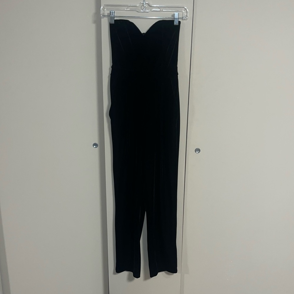 Black velvet jumpsuit from Express